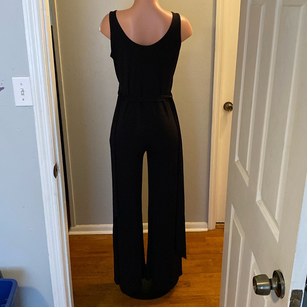 Women’s black jumpsuit w/belt, size medium.